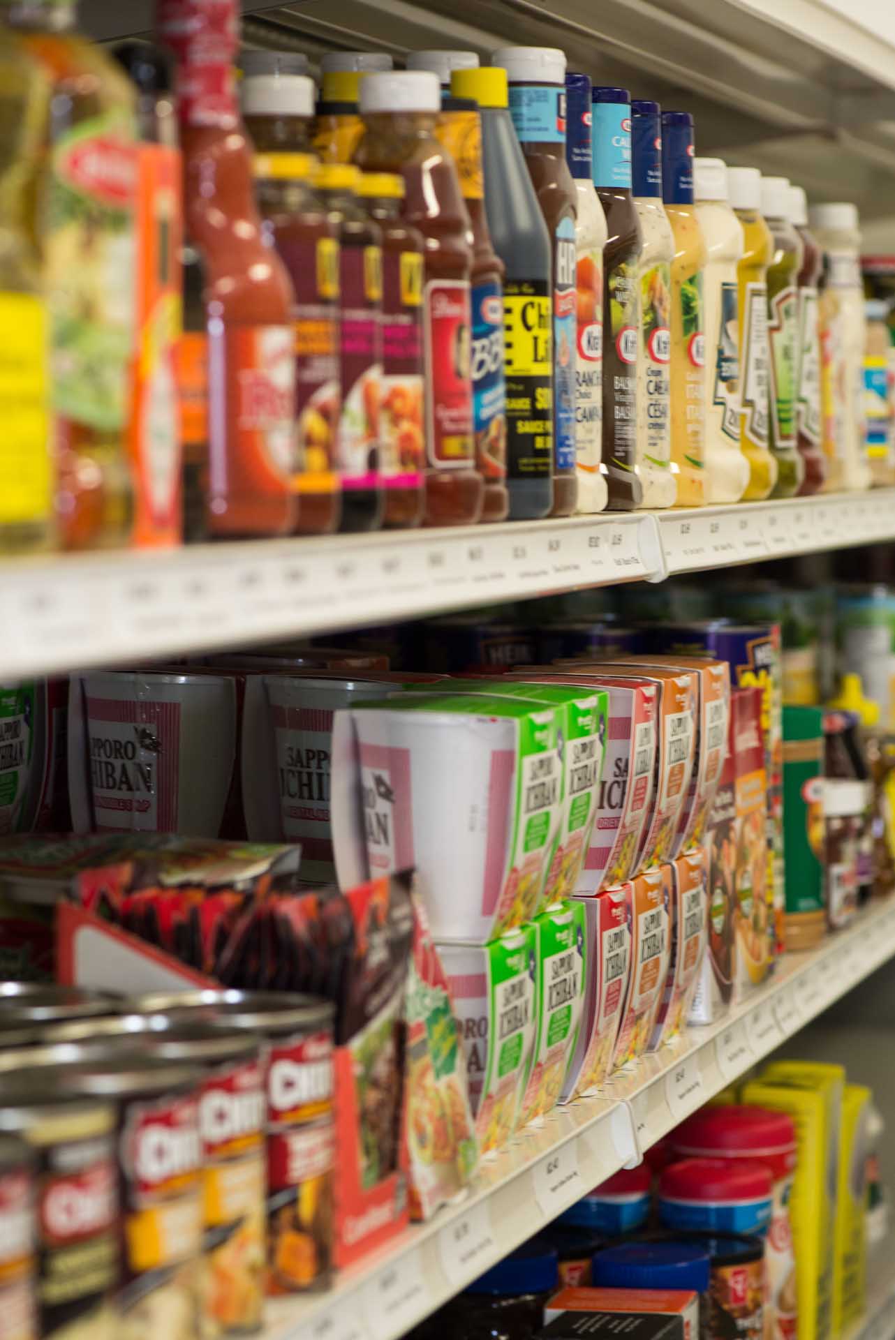 Row of bottled and packed foods